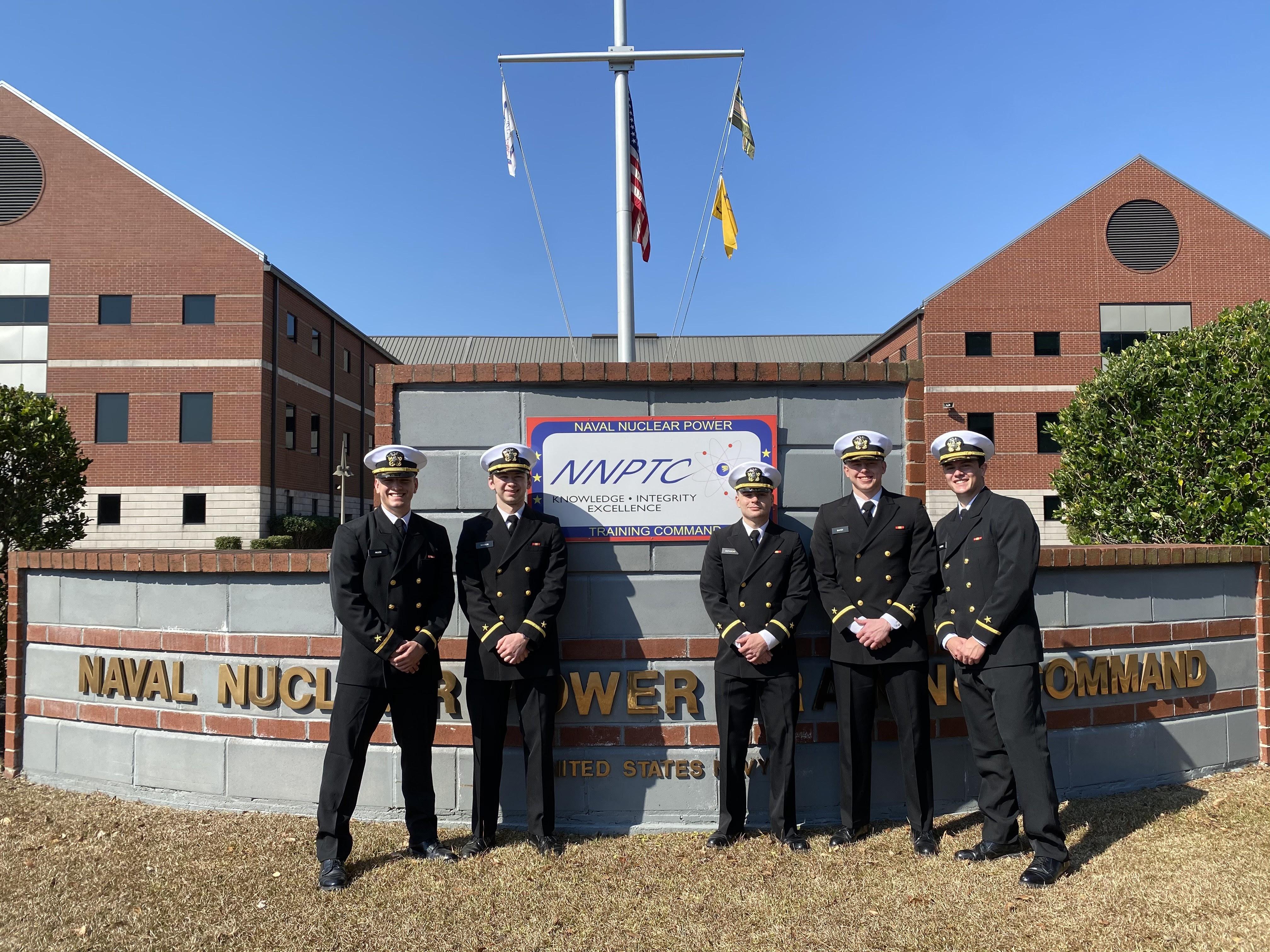 Group of UMD Alumni in Dress Uniforms in front of Nuclear Power School in Charleston, SC